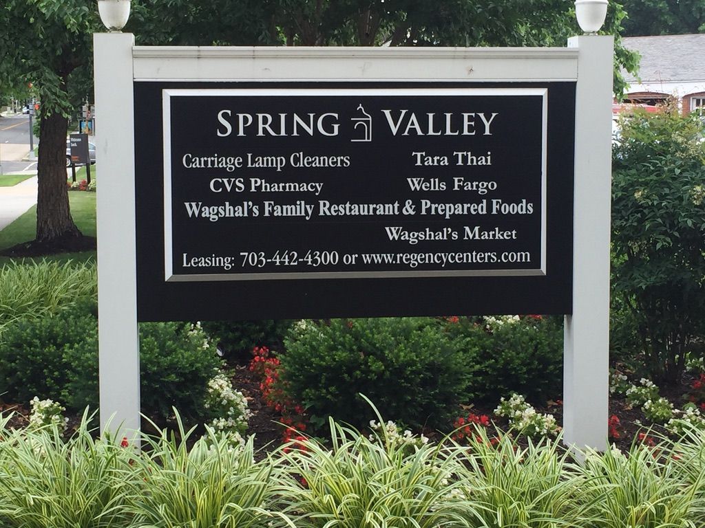 A sign that says spring valley on it