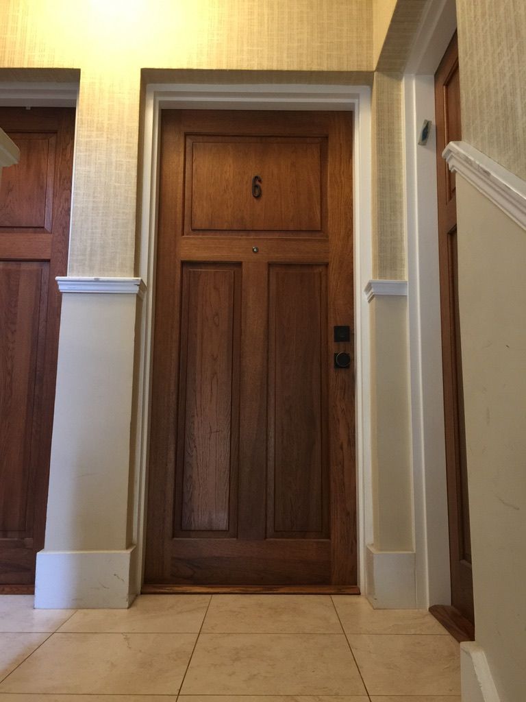 A wooden door with the number 6 on it