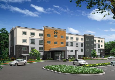 An artist 's impression of a hotel with cars parked in front of it.