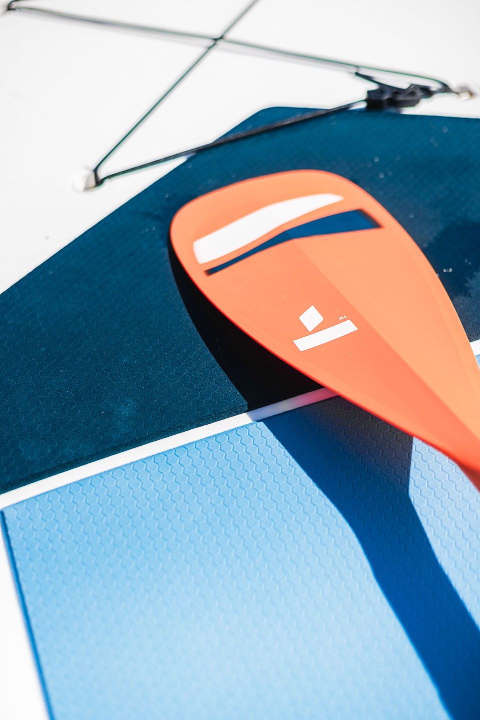 View of a orange Tango kayak from the side and top