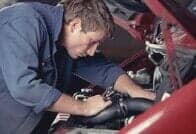Man Working on a Car, Auto Part Sales, Tire Sales in Miramar, FL