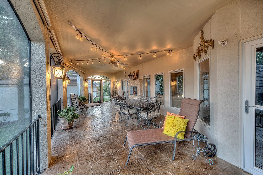 A large room with a lot of windows and chairs.