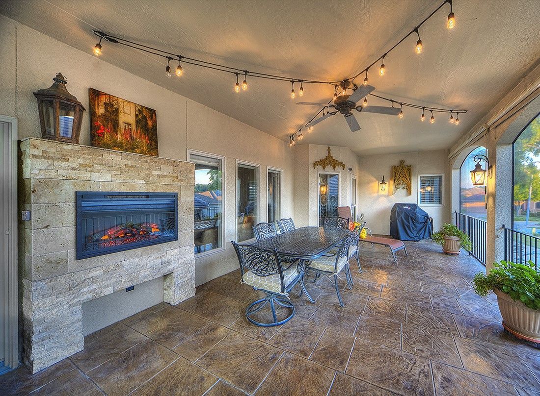 There is a fireplace in the middle of the room.