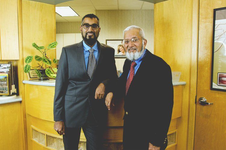 Best family dentist smiling for photo in Monroe Township NJ | Snap on Dentures, Dental Implants, Bridges