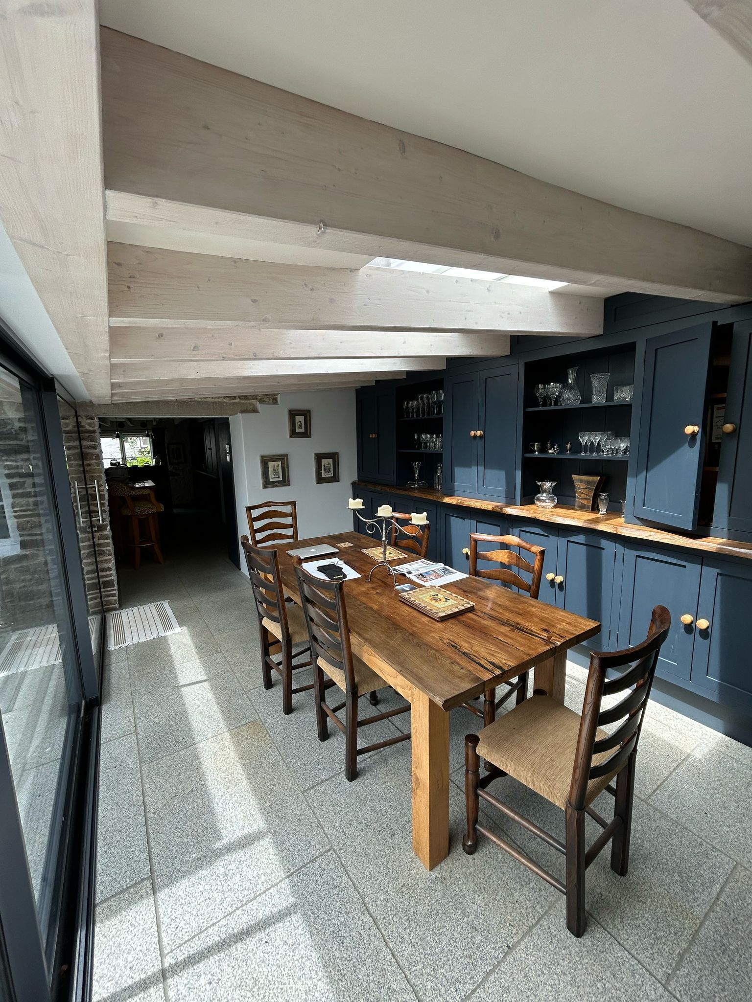 A person is talking on a telephone in an office.