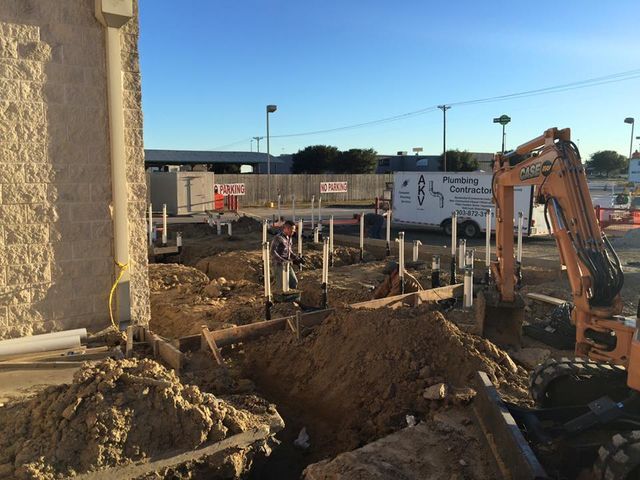Excavator on a construction site — Corsicana, TX — AKV Plumbing Co