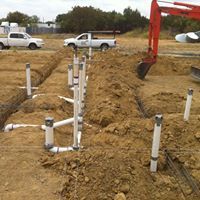 Construction site installing pipe — Corsicana, TX — AKV Plumbing Co