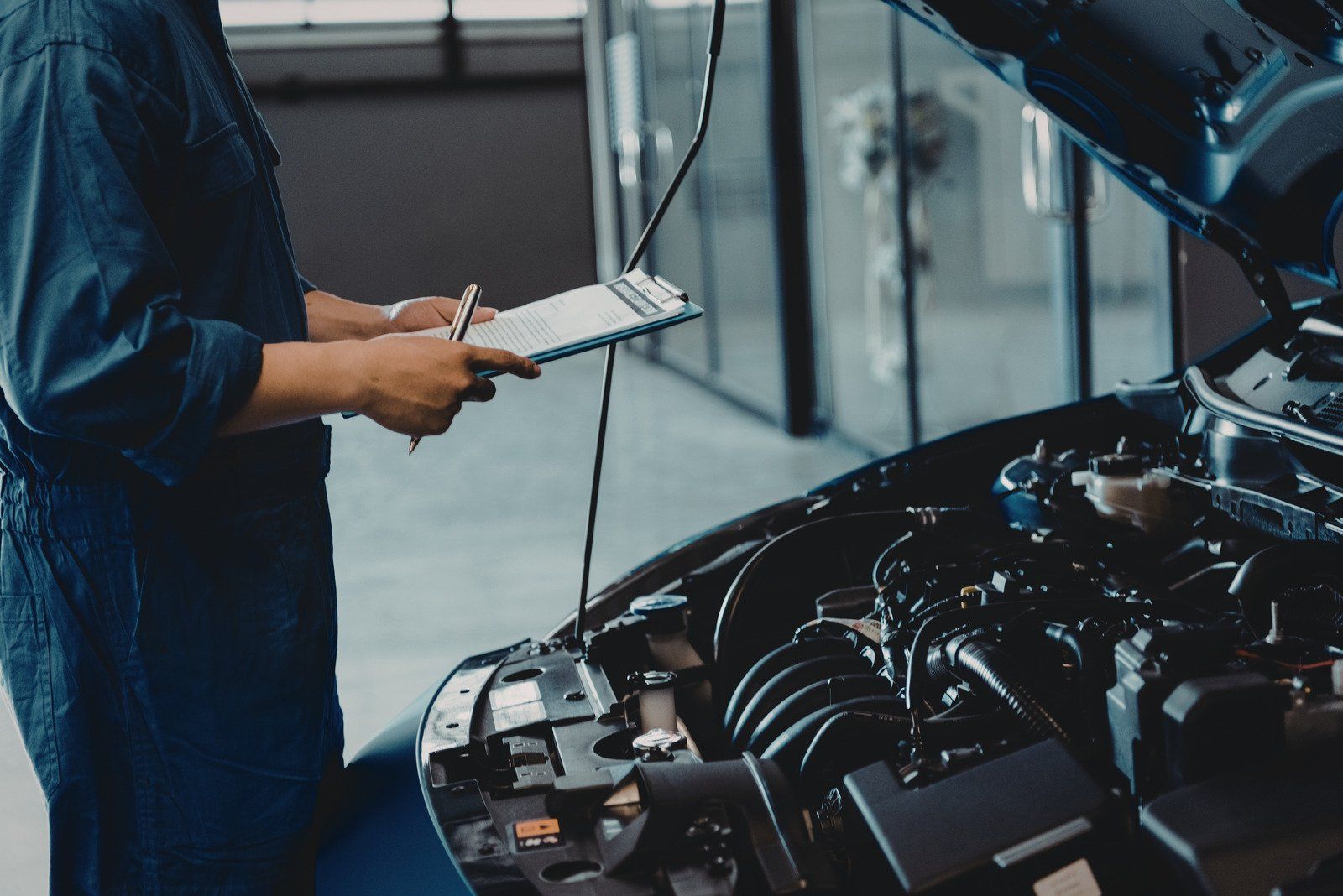 The inside of a refrigerator truck with a refrigerator inside of it.