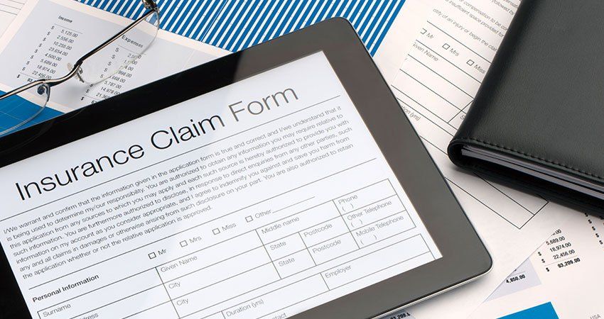 Insurance claim form on a tablet