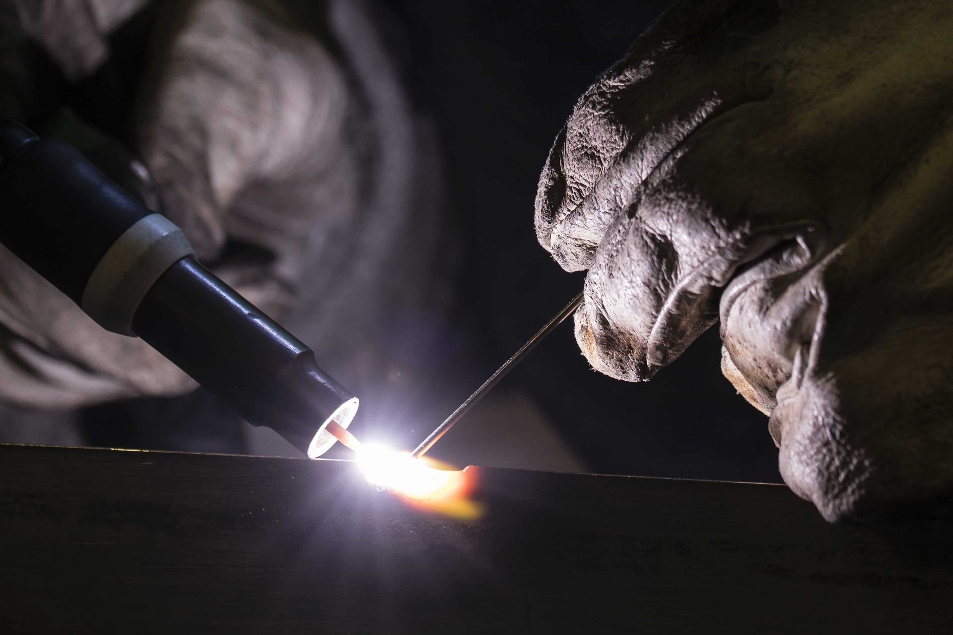 A Close up Of a Person Welding a Piece of Metal — Betts Welding Pty Ltd In Moss Vale, NSW