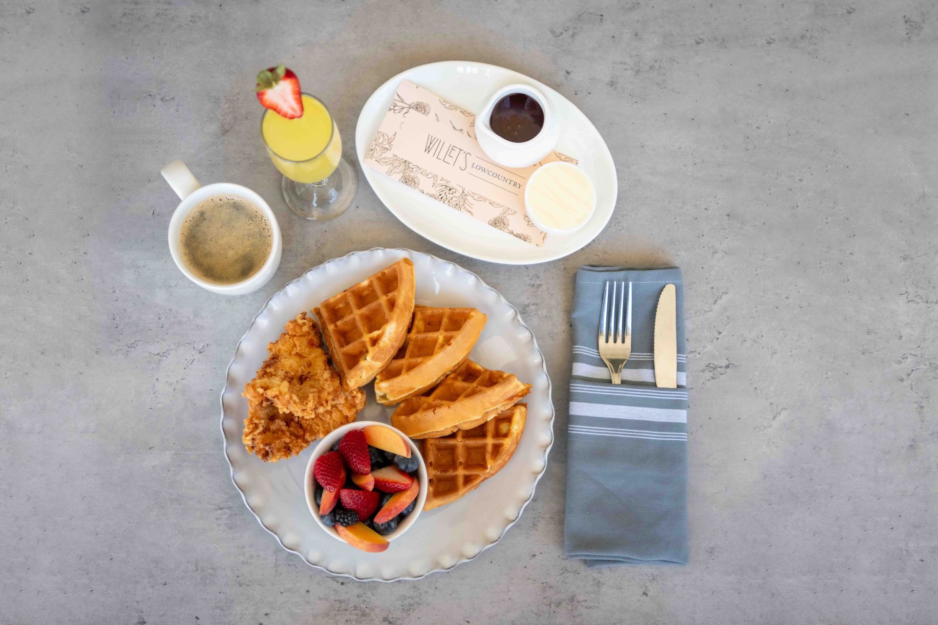 A plate of chicken and waffles from Willet's Lowcountry