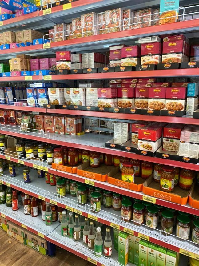 A Grocery Store Aisle Filled With Lots Of Food Products — Suhana Butcher & Grocery Shop In Millner, NT
