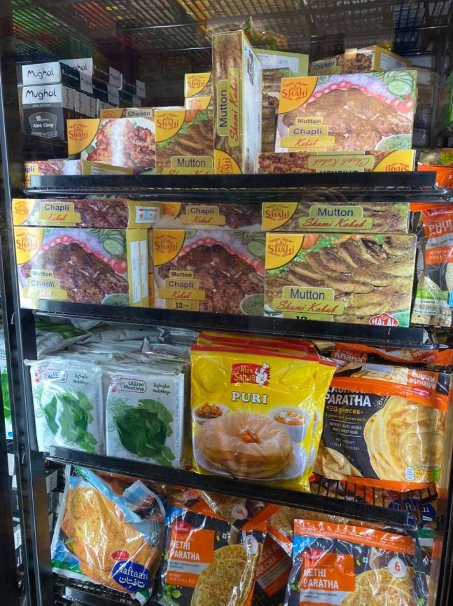A Refrigerator Filled With A Variety Of Frozen Foods — Suhana Butcher & Grocery Shop In Millner, NT