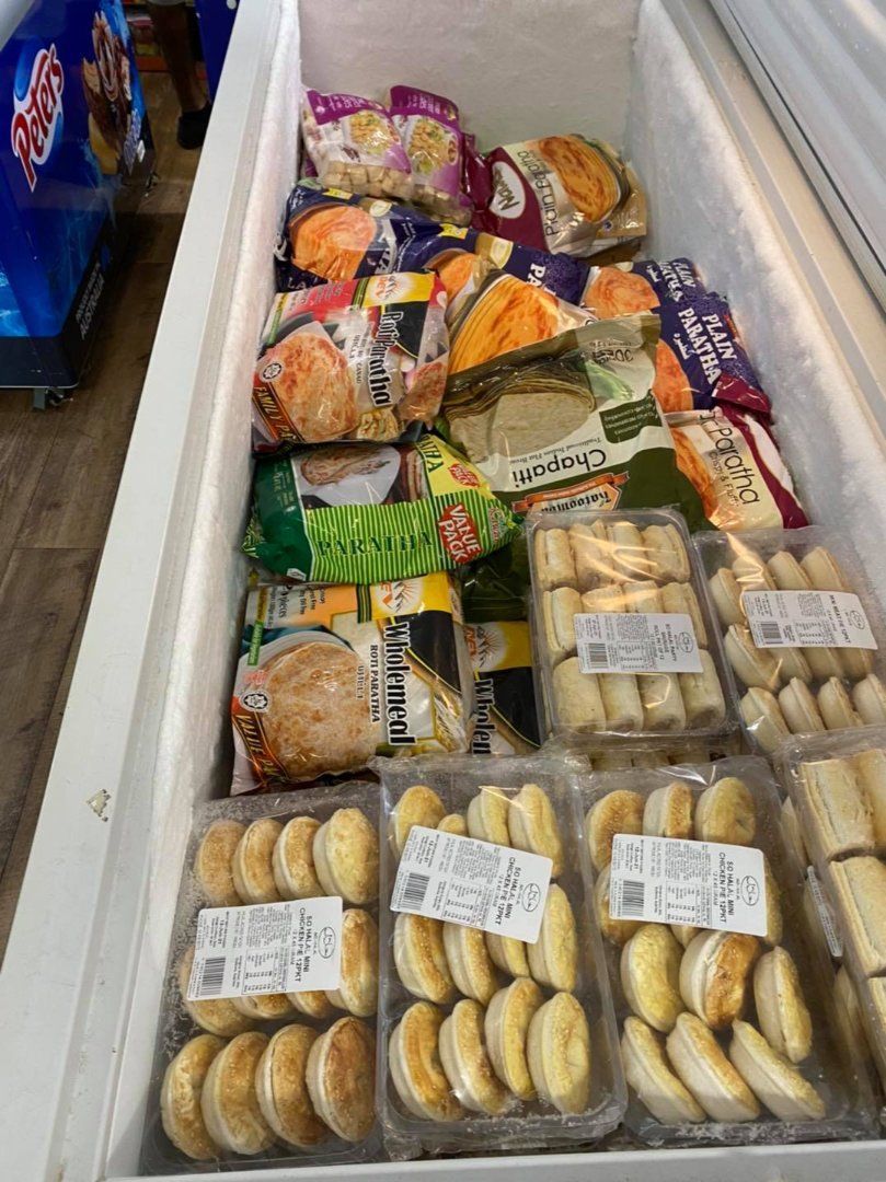 A Freezer Filled With A Variety Of Frozen Foods — Suhana Butcher & Grocery Shop In Millner, NT