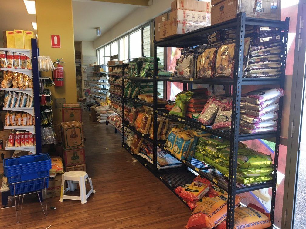 A Store Filled With Shelves Filled With Bags Of Food — Suhana Butcher & Grocery Shop In Millner, NT