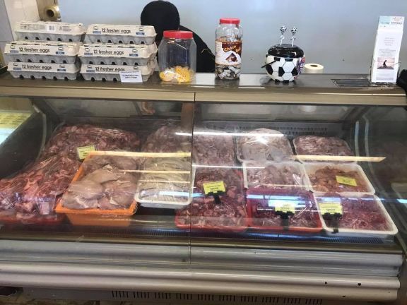 A Butcher 's Display Case Filled With Meat And Eggs — Suhana Butcher & Grocery Shop In Millner, NT