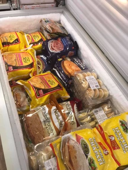 A Freezer Filled With A Variety Of Frozen Foods — Suhana Butcher & Grocery Shop In Millner, NT