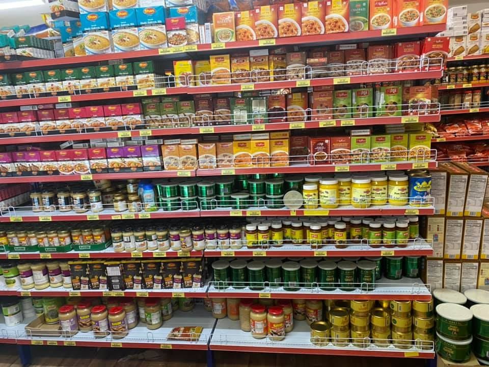 A Grocery Store Aisle Filled With Lots Of Food Items — Suhana Butcher & Grocery Shop In Millner, NT