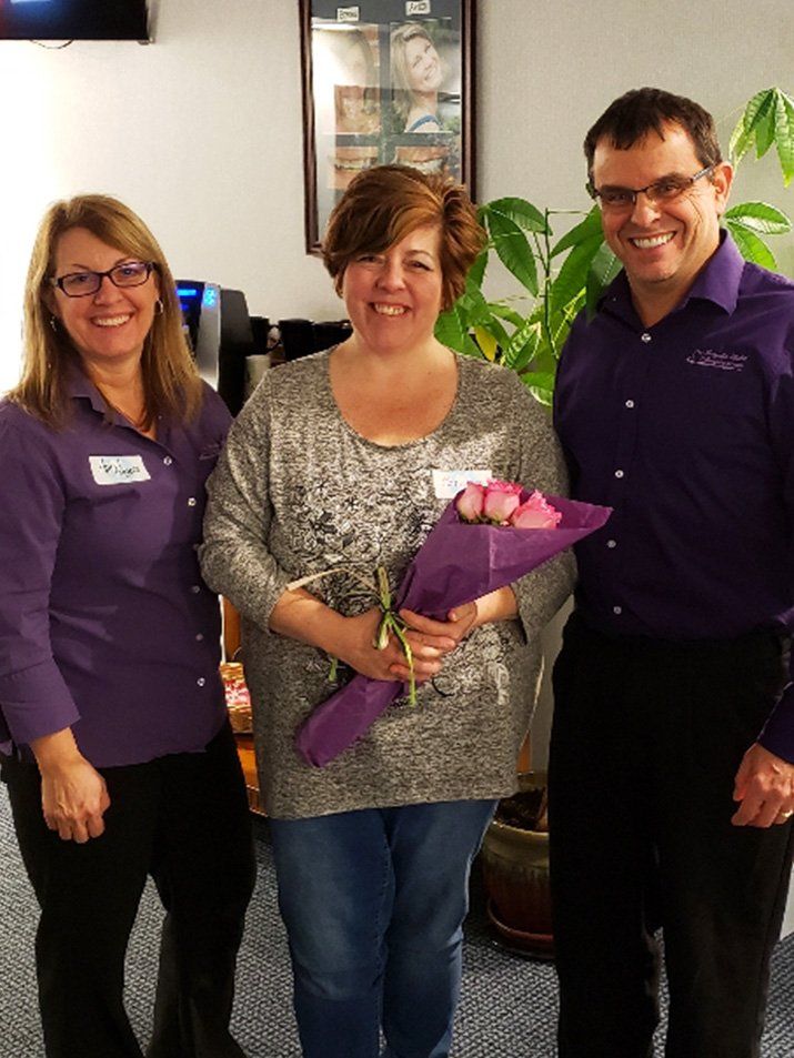 christine lewis with co workers