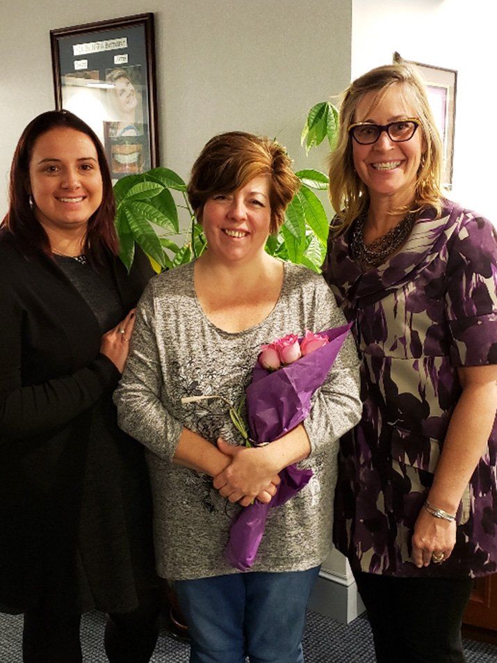 christine lewis with co workers 2