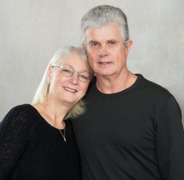 elder couple smiling