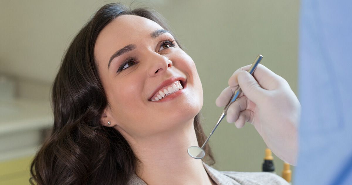 woman at dental cleaning