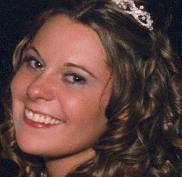 younger woman side smiling