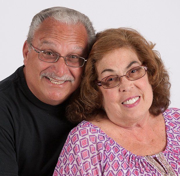 elder woman smiling with husband