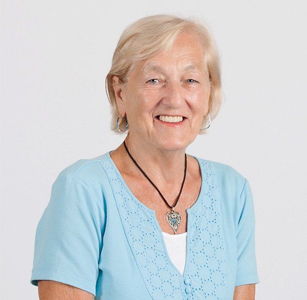 elder woman short hair smiling
