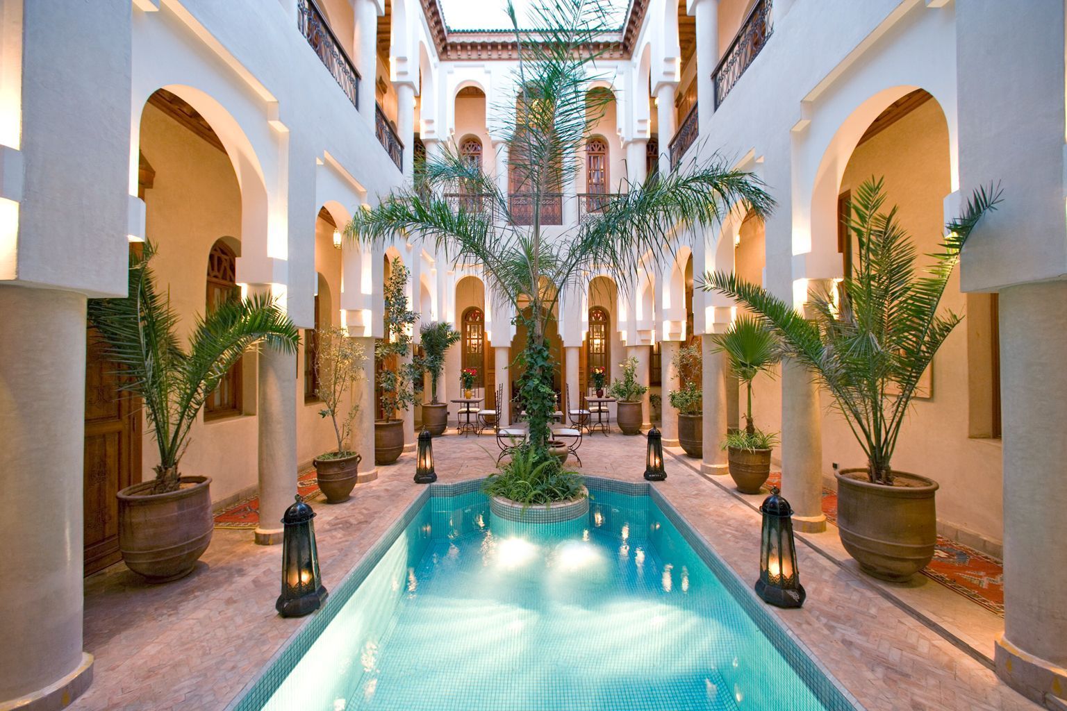 A large swimming pool in the middle of a building