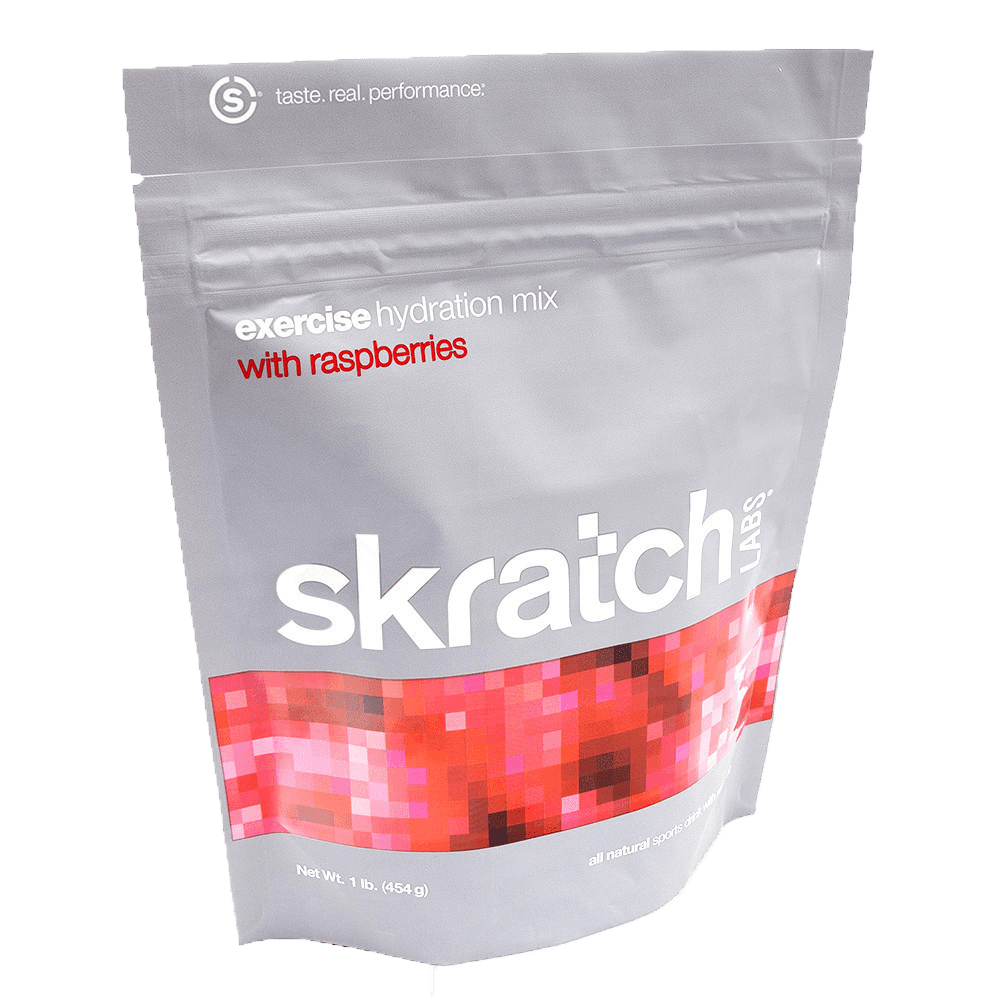A bag of exercise hydration mix with raspberries on a white background.