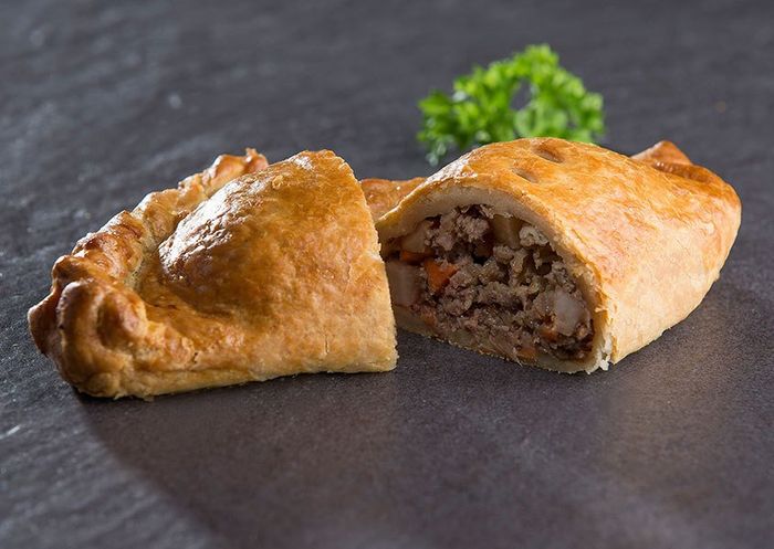 A Cornish pasty that has been cut in half