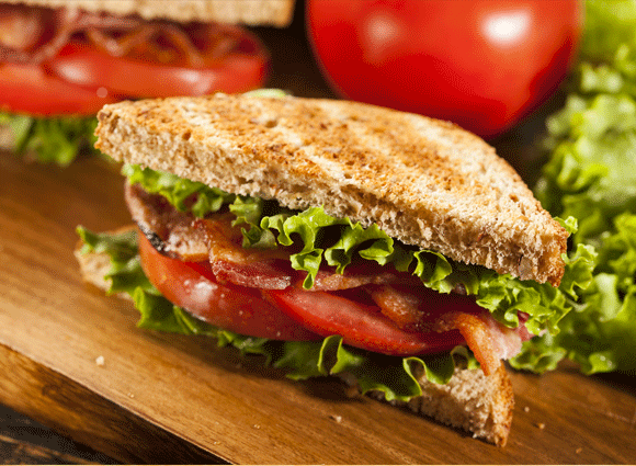 A close up of a toasted BLT 