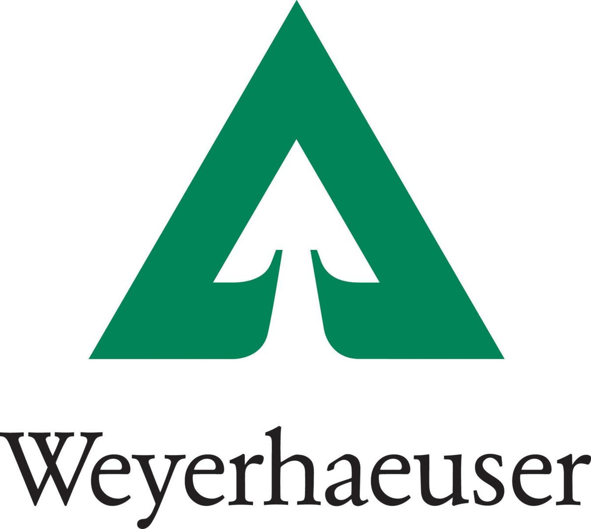 The weyerhaeuser logo has a green triangle with an arrow pointing up
