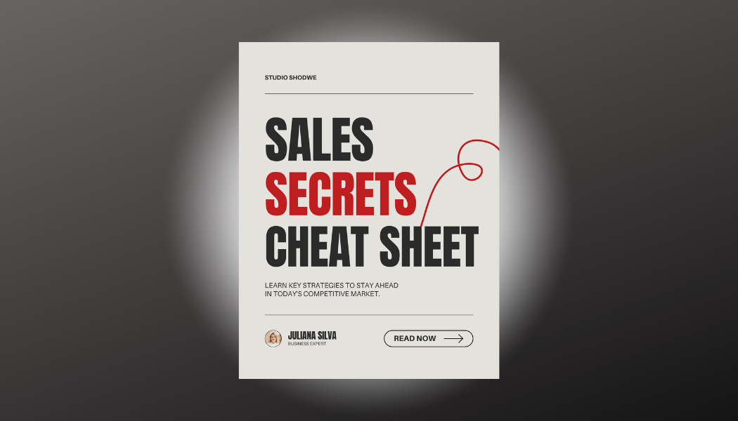 a man is holding a magnet in front of a group of people .