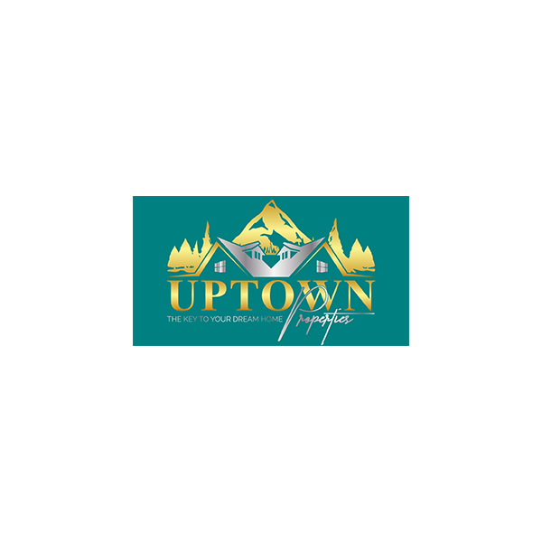 a logo for uptown properties with mountains in the background