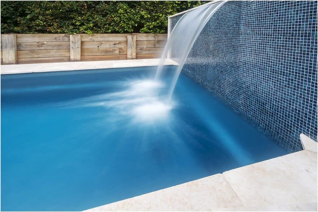 There is a Waterfall in the Middle of the Pool — Pooltech NT In Alawa, NT