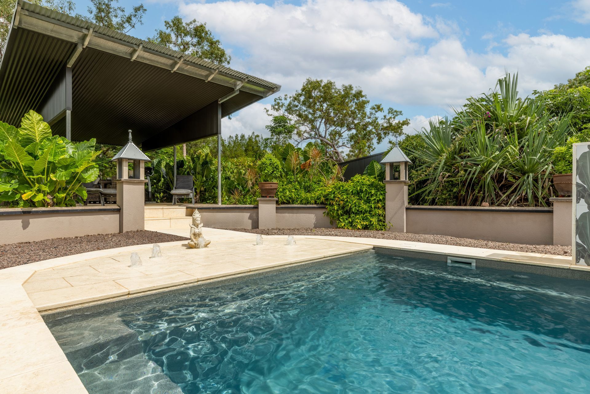 A Large Swimming Pool with A Gazebo in The Background — Pooltech NT In Alawa, NT