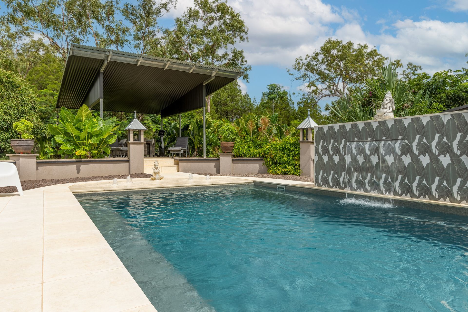 A Large Swimming Pool with A Gazebo in The Background — Pooltech NT In Alawa, NT