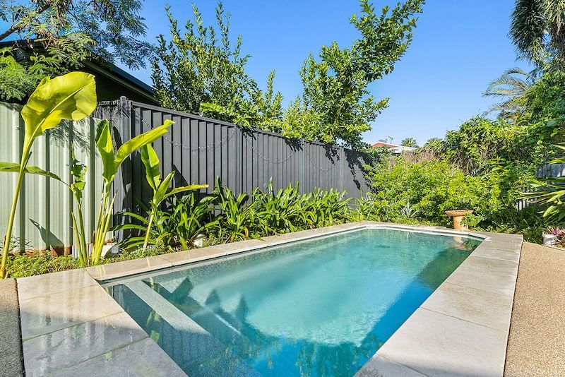 A Swimming Pool in a Backyard — Pooltech NT In Alawa, NT