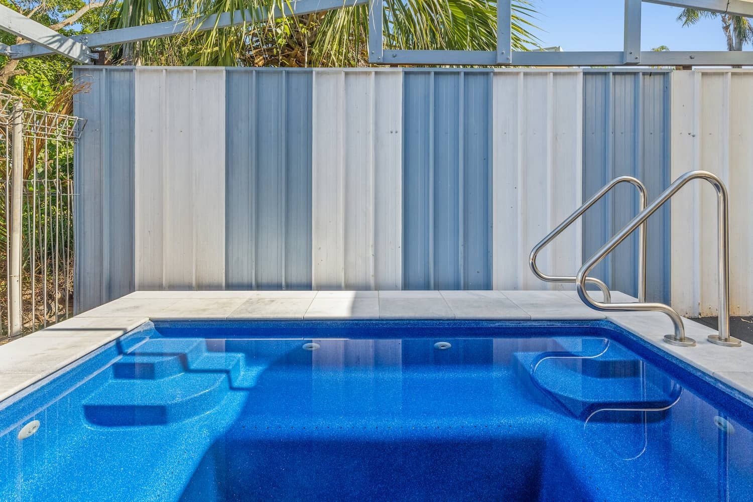 A Small Blue Swimming Pool With Stairs Leading to It — Pooltech NT In Alawa, NT