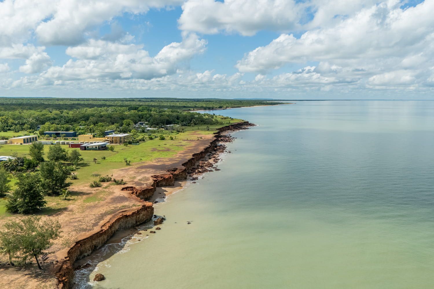 An Aerial View of a Cliff Overlooking a Body of Water — Pooltech NT In Alawa, NT