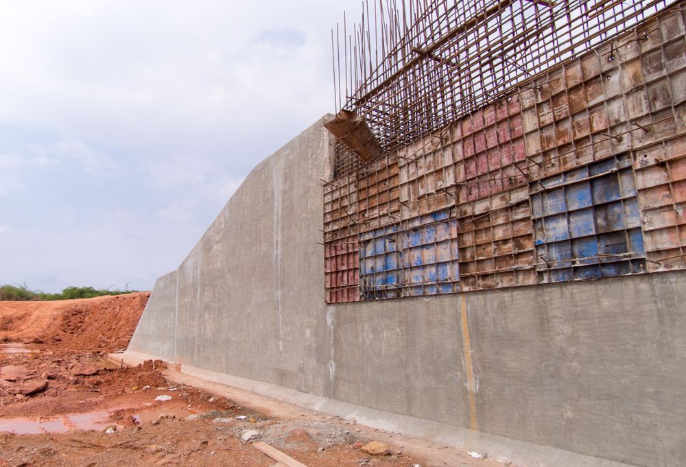Concrete Retaining Wall Under Construction — BC Earthmoving & Civil Construction in East Barron QLD

