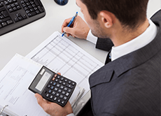 male using calculator