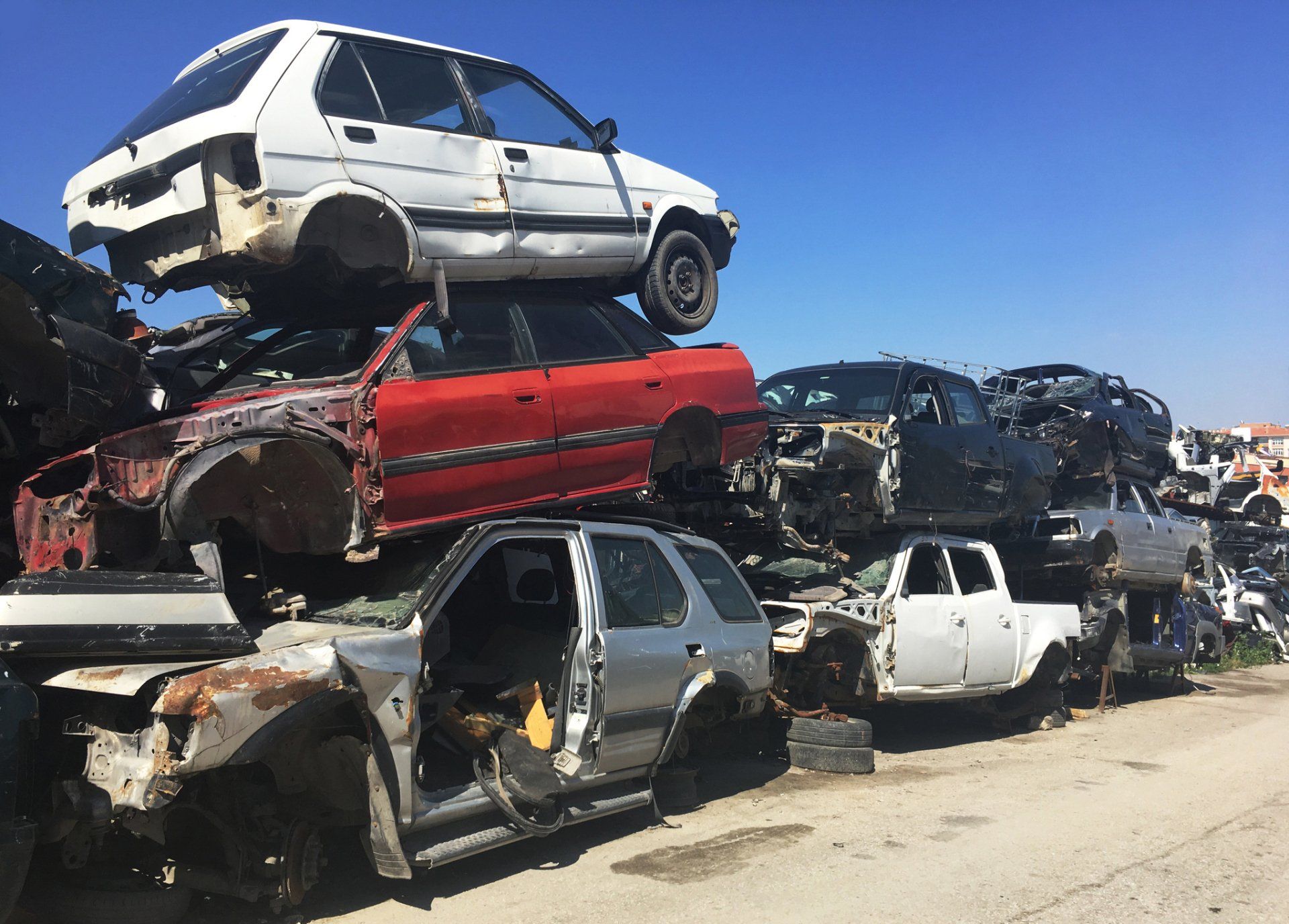 Old Cars Stacked on the Junkyard — Chicago, IL — Cash For Cars