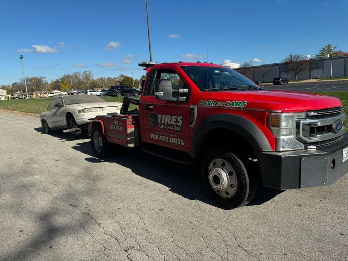 Crane Picking Up Car — Chicago, IL — Cash for Cars