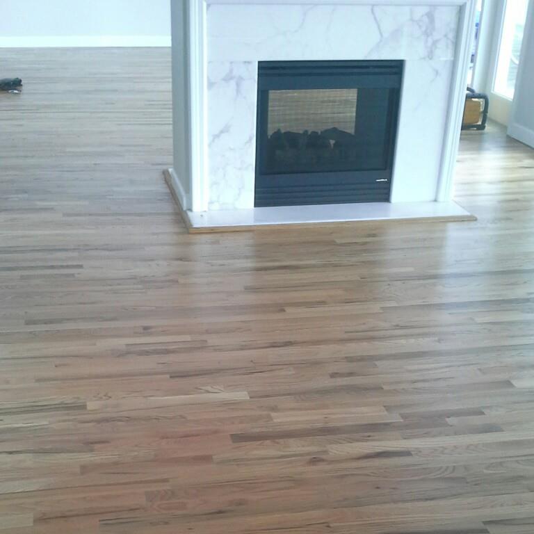 Home with Hardwood Floor and Fireplace — Pensacola, FL — Central Hardwood Flooring