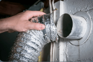 Dryer Vent Cleaning technician cleaning dryer vent