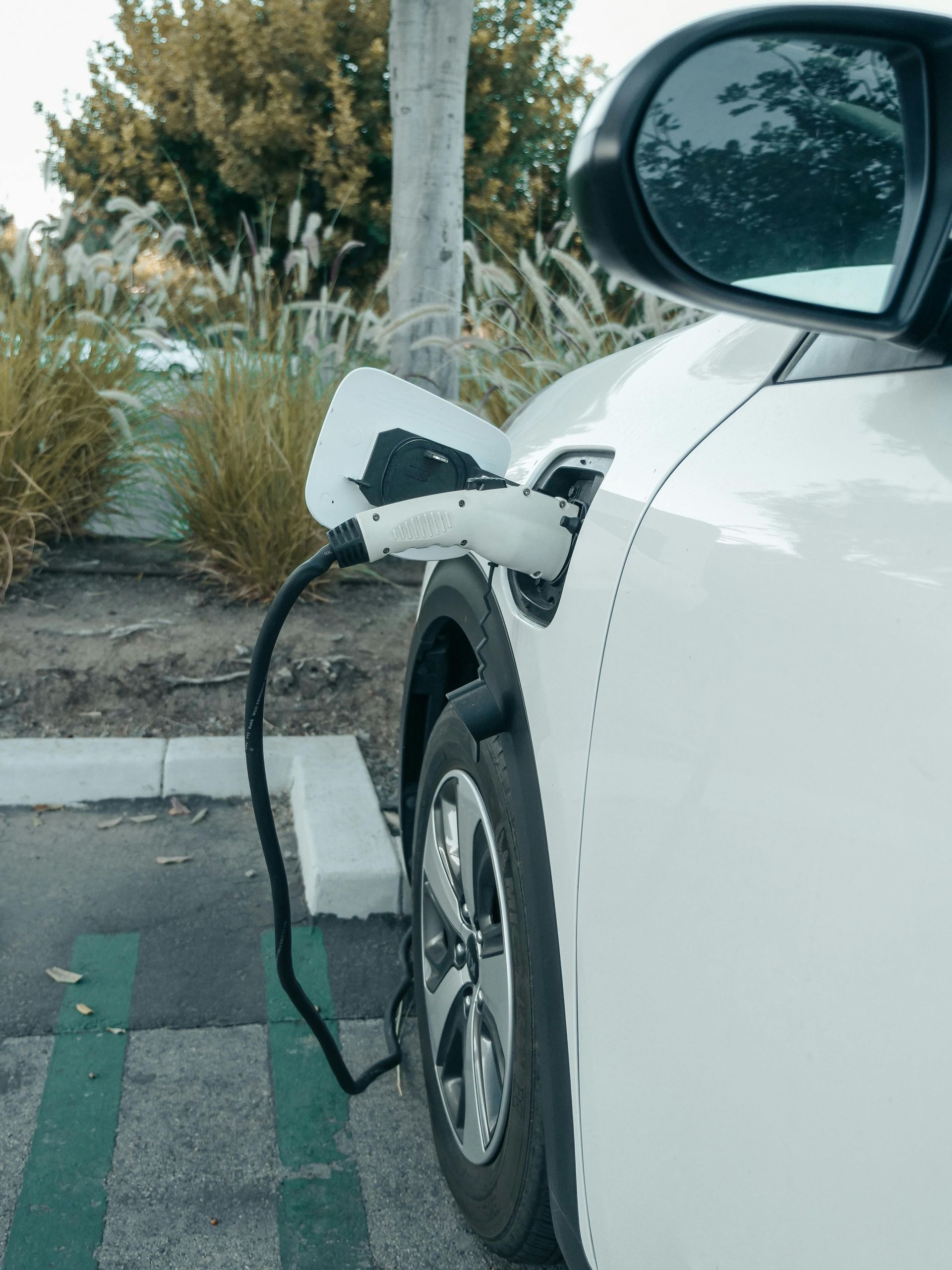 EV charger plugged into car