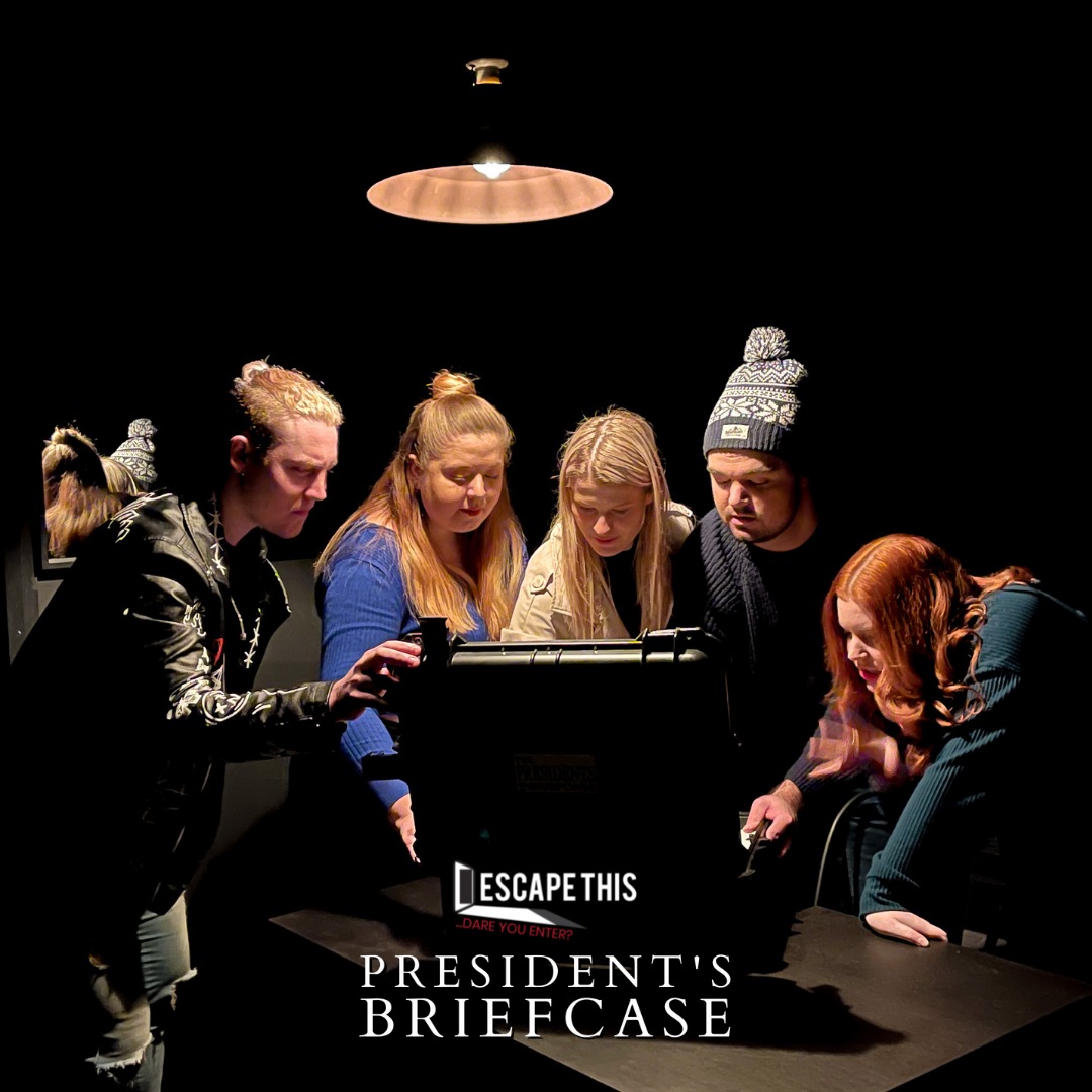 A group of players in The President's briefcase Escape Room